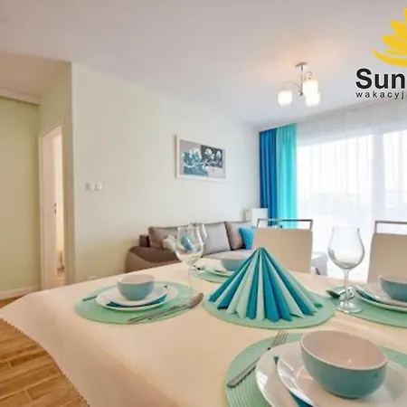 Апартаменты Sunflowers Apartament Turkusowy Zakatek W Kolobrzegu Колобжег